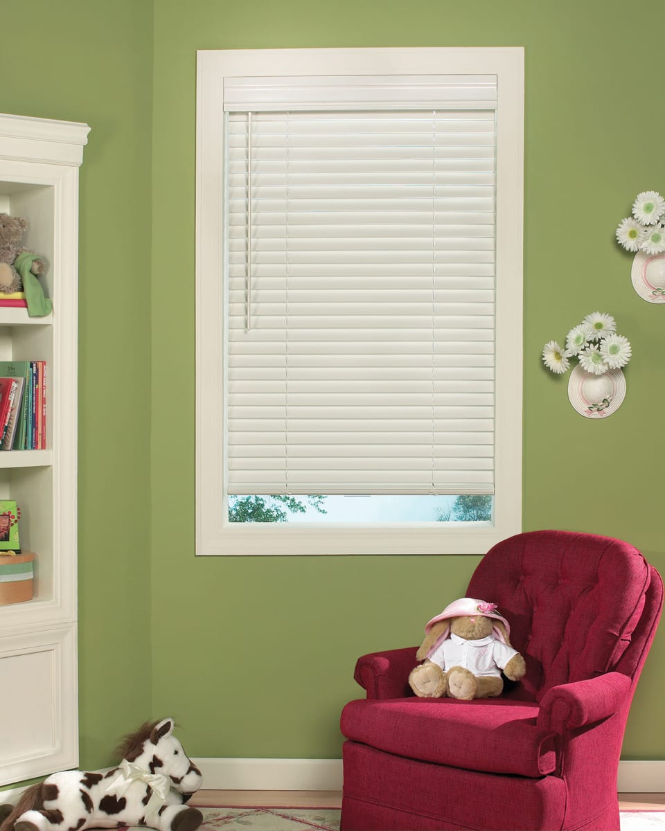 Faux wood blinds with wand tilt.
