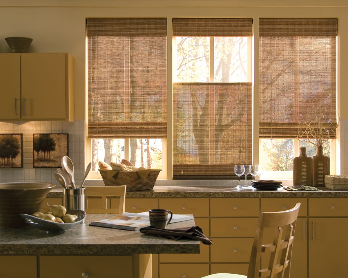Woven wood shades in a kitchen.