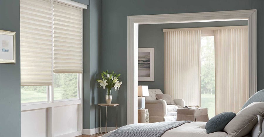 Cellular shades in a bedroom.