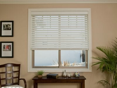 2" faux wood blinds in a hall.