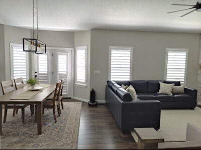 White Hidden Tilt shutters in a Dining and Living area